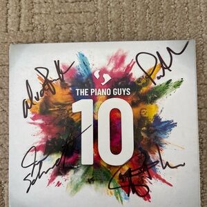 Autographed Piano Guys '10' Album with 2 CDs and 1 DVD
